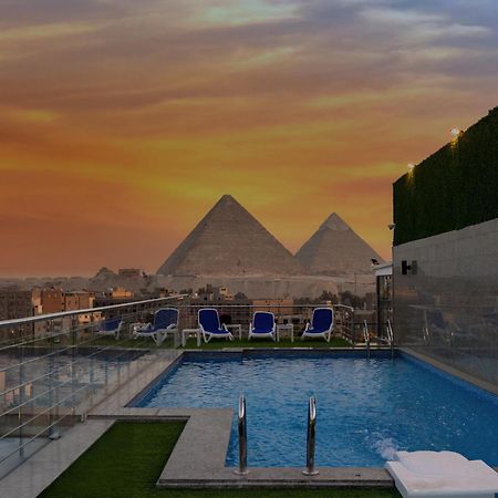 Al Kawm al Akhdar Gold'S Pyramids Hotel מראה חיצוני תמונה